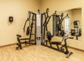 Thumbnail 26 of 31 - Fully equipped fitness center onsite at Spring Hill Apartments & Townhomes, Maryland