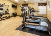 Thumbnail 25 of 31 - Fully equipped fitness center onsite at Spring Hill Apartments & Townhomes, Baltimore