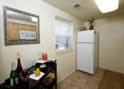 Thumbnail 5 of 10 - Small eat in kitchen with natural light at Colony Hill Apartments & Townhomes, Baltimore, 21227