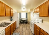 Thumbnail 3 of 29 - Apartment kitchen and dining room at Woodbridge Apartments located in Randallstown, MD