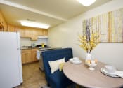 Thumbnail 11 of 19 - Bright kitchen with plenty of cabinets at Winston Apartments, Baltimore Maryland