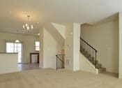 Thumbnail 5 of 16 - Main level with living room and kitchen at The Pointe at Manorgreen Townhomes, Maryland