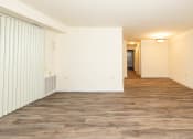 Thumbnail 10 of 33 - Living room with a wood floor and white walls at Seminary Roundtop Apartments, Lutherville