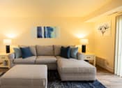 Thumbnail 3 of 23 - Living room with a couch and a chairat Rockdale Gardens Apartments*, Baltimore, MD