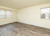 Thumbnail 14 of 33 - Bedroom with hardwood flooring and two windows at Seminary Roundtop Apartments, Lutherville, MD, 21093