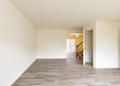 Thumbnail 8 of 22 - a bedroom with hardwood floors and white walls at Carlson Woods Townhomes, Baltimore