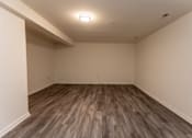 Thumbnail 9 of 22 - a bedroom with hardwood floors and walls at Carlson Woods Townhomes, Maryland
