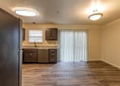 Thumbnail 4 of 22 - a kitchen and living room at Carlson Woods Townhomes, Baltimore, MD