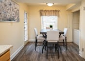 Thumbnail 10 of 25 - View of an eat-in kitchen with a table and chairs at Ivy Hall Apartments*, Towson, MD
