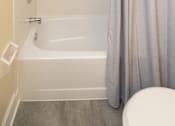 Thumbnail 16 of 25 - Bathroom with a tub-shower at Ivy Hall Apartments*, Towson, MD 21204