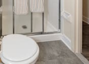 Thumbnail 22 of 25 - Bathroom with walk-in shower at Ivy Hall Apartments*, Towson, MD 21204.
