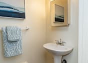Thumbnail 8 of 32 - A half bath at Spring Hill Apartments & Townhomes, Baltimore, MD 21234.