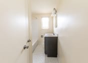 Thumbnail 9 of 22 - a bathroom with a sink and bathtub at Foxridge Townhomes, Maryland, 21221