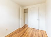 Thumbnail 11 of 22 - Bright bedroom with closet space at Foxridge Townhomes, Maryland