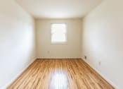 Thumbnail 14 of 22 - Bright bedroom at Foxridge Townhomes, Baltimore, MD
