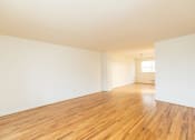 Thumbnail 4 of 22 - Shiny hardwood floors in the living room at Foxridge Townhomes, Maryland