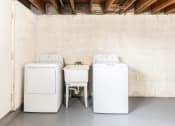 Thumbnail 21 of 22 - Large finished basement with washer and dryer at Foxridge Townhomes, Baltimore