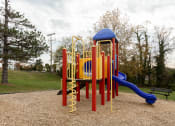 Thumbnail 11 of 15 - a colorful playground in a park at Lawyers Hill Apartments, Elkridge, 21075