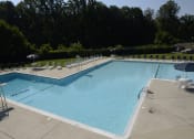 Thumbnail 23 of 29 - Poolside Entertainment Area at Woodridge Apartments, 3901 Noyes Circle, Randallstown, MD 21133