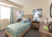 Thumbnail 7 of 15 - a bedroom with a bed and two night stands at Lawyers Hill Apartments, Elkridge, 21075
