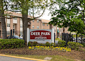 Thumbnail 25 of 27 - Property Signage at Deer Park Apartments, Randallstown Maryland