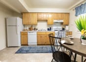 Thumbnail 4 of 17 - Dining Area at Somerset Woods Townhomes, Severn, MD