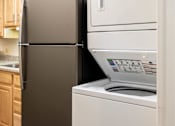 Thumbnail 4 of 25 - a kitchen with a refrigerator and a dishwasher  at Charlesgate Apartments, Towson, MD