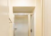 Thumbnail 20 of 25 - a bathroom with a shower and toilet in a 555 waverly unit  at Charlesgate Apartments, Maryland