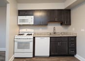 Thumbnail 1 of 25 - Modern Kitchen at McDonogh Village Apartments & Townhomes, Randallstown, MD, 21133
