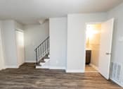 Thumbnail 5 of 25 - A bedroom with a staircase in a 555 waverly unit at McDonogh Village Apartments & Townhomes, Randallstown, Maryland, 21133