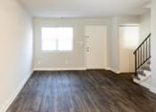 Thumbnail 4 of 25 - Bedroom with hardwood floors and white walls at McDonogh Village Apartments & Townhomes, Randallstown, 21133