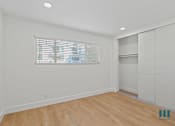 Thumbnail 20 of 30 - Bedroom with Closet, Recessed Lighting, Vinyl Flooring, and Windows