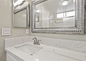 Thumbnail 19 of 62 - Bathroom with Sink and Mirror