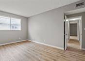 Thumbnail 15 of 62 - Bedroom with Window and Vinyl Flooring