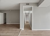 Thumbnail 26 of 62 - Living Room and Hallway to Bedrooms