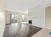 Thumbnail 30 of 62 - Living Room with Electric Fireplace, Vinyl Flooring, and Balcony