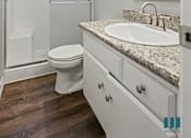 Thumbnail 34 of 62 - Bathroom with Walk-In Shower and Vanity Cabinet Storage