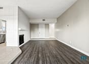 Thumbnail 46 of 62 - Living Room with Storage Closet and Vinyl Flooring