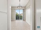 Thumbnail 49 of 62 - Dining Room with Balcony