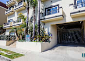 Thumbnail 45 of 48 - Front Entrance of Building and Resident Garage