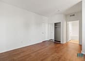 Thumbnail 38 of 65 - Bedroom with Bathroom, Closet, and Vinyl Flooring