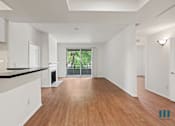 Thumbnail 40 of 65 - Open-Concept Kitchen, Dining, and Living Room Areas