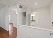 Thumbnail 46 of 65 - Front Entrance, Hall Bathroom, and Hall Closet
