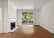 Thumbnail 35 of 65 - Living Room with Electric Fireplace, Vinyl Flooring, and Patio