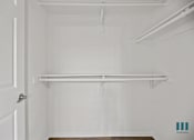 Thumbnail 57 of 65 - Walk-In Closet with Double Hanging Rods