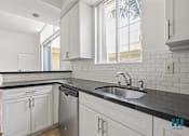 Thumbnail 54 of 65 - Full-Size Kitchen in Studio Apartment