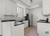 Thumbnail 56 of 65 - Kitchen with Energy-Efficient Stainless Appliances