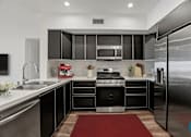 Thumbnail 11 of 71 - Large-Size Kitchen with Energy-Efficient Appliances and Ample Cabinet Storage