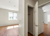 Thumbnail 18 of 38 - Hall Closet with Hanging Rod