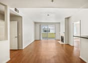 Thumbnail 10 of 38 - Open-Concept Kitchen, Dining, and Living Room Space